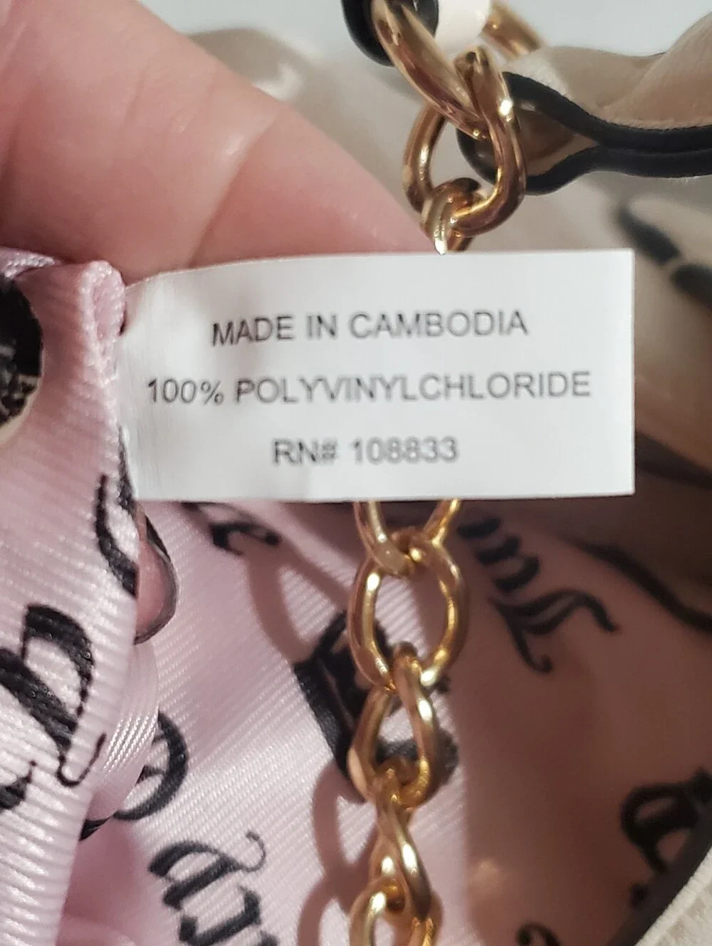 JUICY COUTURE ROYAL CREST HOBO BAG. SOFT WHITE. GOLD TONE CHAIN.